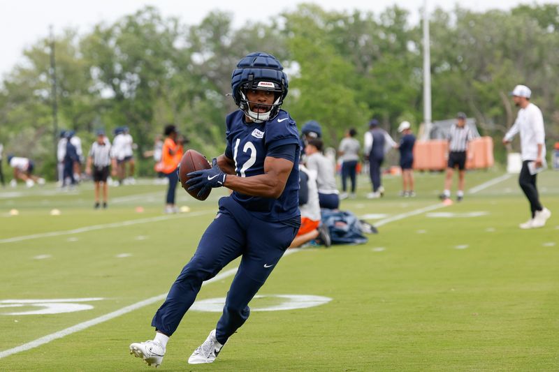 Jun 3, 2025; Lake Forest, IL, USA; Chicago Bears wide receiver Devin Duvernay (12) runs with the ball during minicamp at Halas Hall. Mandatory Credit: Kamil Krzaczynski-Imagn Images