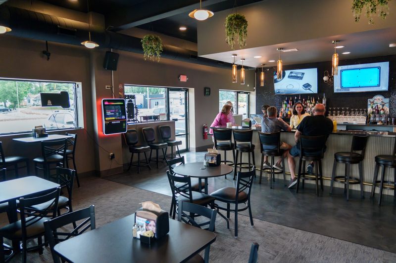 From the look and feel of the spacious dining room and bar at Go Vino Bar & Grill at 1303 N. 8th Street in Pekin, customers would never know the business had once been a service station.