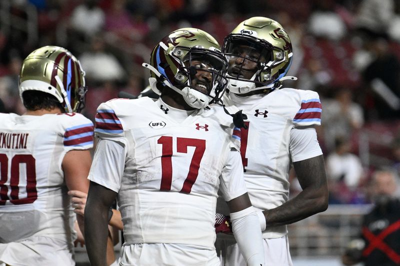 Michigan Panthers wide receiver Malik Turner (17) is congratulated by teammates after scoring a touchdown against the DC Defenders during the second quarter of the 2025 UFL Championship at The Dome at America's Center in St. Louis on Saturday, June 14 2025.