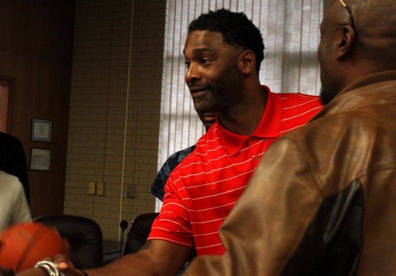 Springfield High boys basketball coach Kevin Causley meets with the parents and players at Grant Middle School on Wednesday, June 18, 2025.