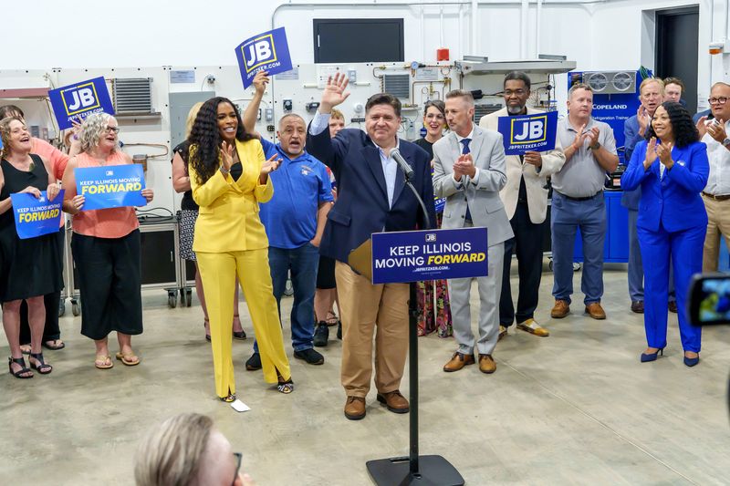 Gov. JB Pritzker greets supporters during a visit to Illinois Central College's Workforce Sustainability Center on his four-city re-election announcement tour Thursday, June 26, 2025 in East Peoria.