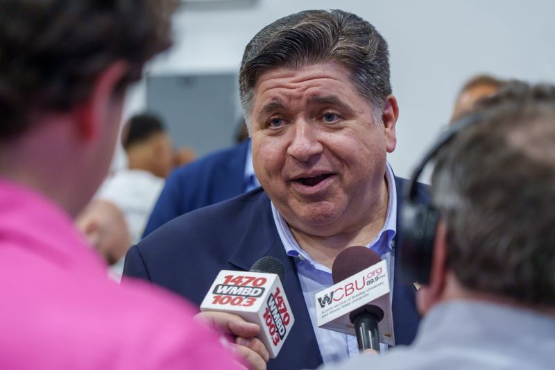 Gov. JB Pritzker answers questions from the local media June 26, 2025, at Illinois Central College's Workforce Sustainability Center in East Peoria during his four-city tour to announce his reelection.