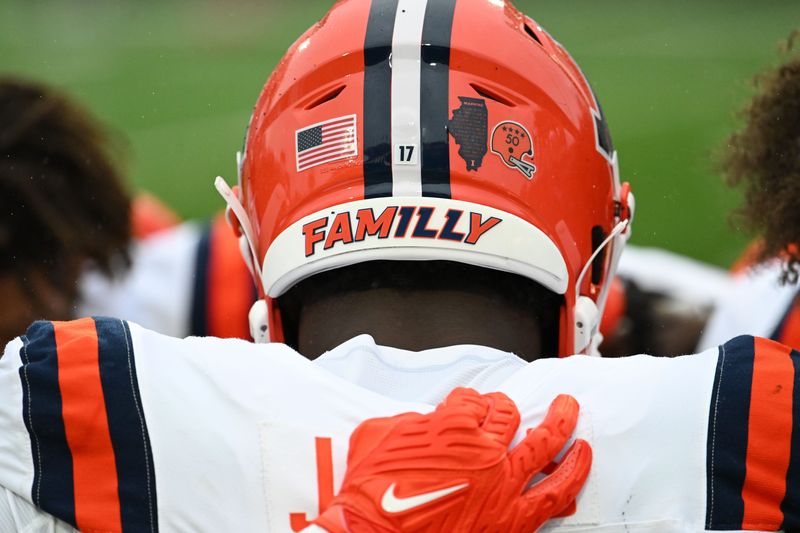 Oct 14, 2023; College Park, Maryland, USA; Illinois Fighting Illini linebacker Gabe Jacas (17) huddles along the sidelines with teammates before the game against the Maryland Terrapins at SECU Stadium. Mandatory Credit: Tommy Gilligan-USA TODAY Sports