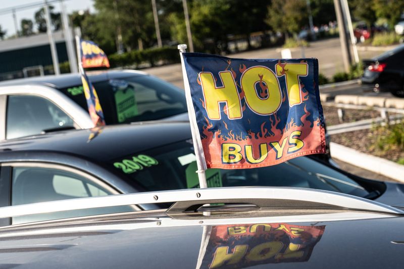 Pre-owned cars and trucks are parked in a lot at Gordon Chevrolet in Garden City on Monday, August 23, 2021.