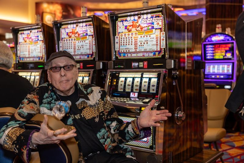 Hard Rock Casino Rockford celebrates its upcoming one-year anniversary Aug. 7, 2025, with the unveiling of a custom Rick Nielsen slot machine. Nielsen is lead guitarist of the legendary rock band Cheap Trick, which hails from Rockford, and is the inspiration behind the Rockford casino's signature checkerboard guitar sign.