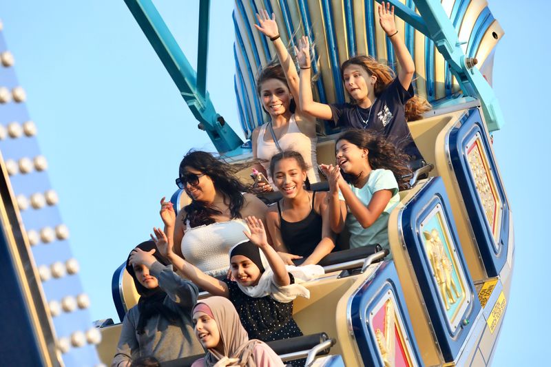 Fairgoers enjoy a carnival ride Aug. 5, 2025, during the Boone County Fair in Belvidere.
