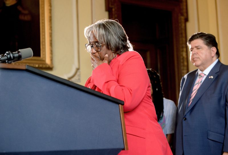 State Sen. Doris Turner, D-Springfield, tries to hold back tears as she speaks at the signing of the Sonya Massey Act at the Illinois State Capitol on Aug. 12, 2025.
