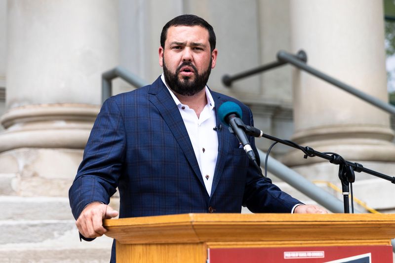 Dillan Vancil, a Republican candidate in Illinois' 17th Congressional District, speaks during a news conference Aug. 27, 2025, outside Rockford's Veterans Memorial Hall.