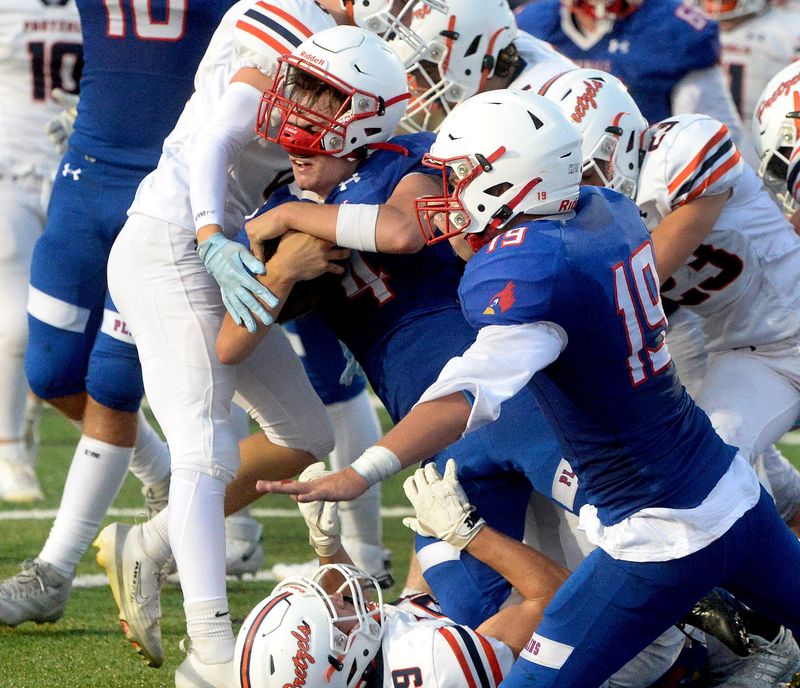 Pleasant Plains' Xander Smith drives his way into the end for a touchdown during the game against New Berlin Friday, August 29, 2025.