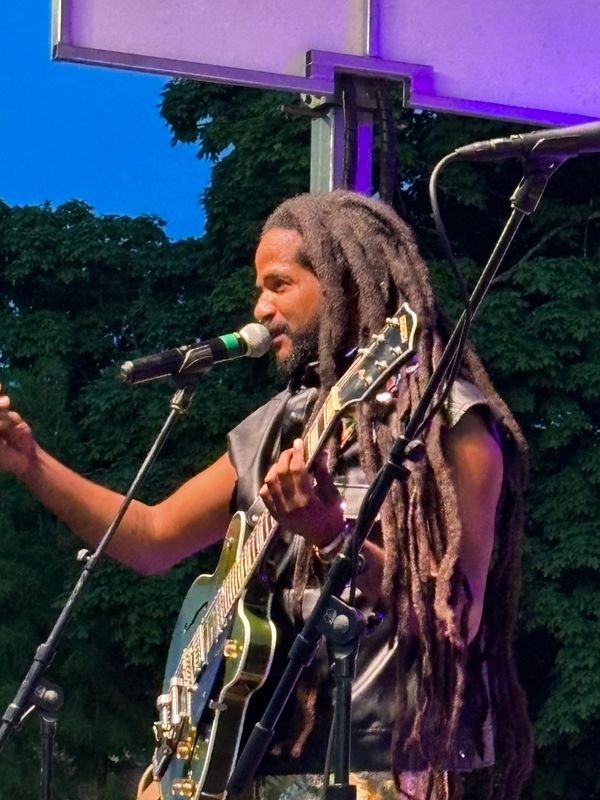 Haitian musician Paul Beaubrun, who is also a touring musician with the band Arcade Fire, performs at the Levitt AMP Springfield Music Series at the Y Block in downtown Springfield, Ill., on May 30, 2024.