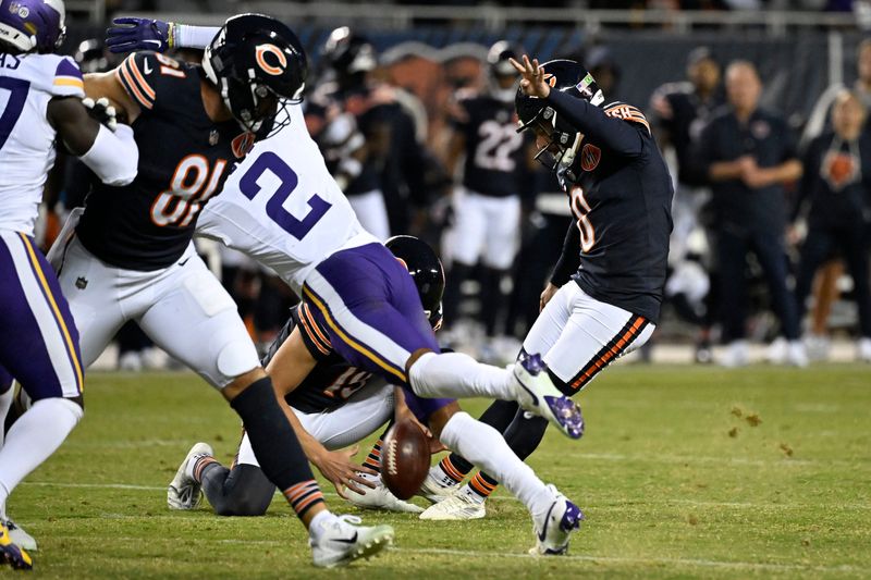 Sep 8, 2025; Chicago, Illinois, USA; Chicago Bears place kicker Cairo Santos (8) kicks a field goal against the Minnesota Vikings during the second half at Soldier Field. Mandatory Credit: Matt Marton-Imagn Images