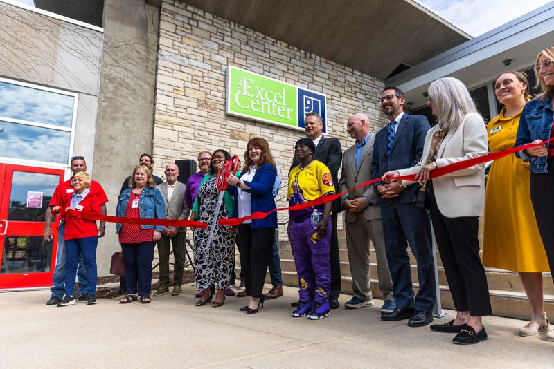 Courtney Geiger, director of mission services for Goodwill Industries of Northern Illinois, cuts the ribbon during the grand opening of the Excel Center on Sept. 10, 2025, at the SwedishAmerican Riverfront YMCA in Rockford.