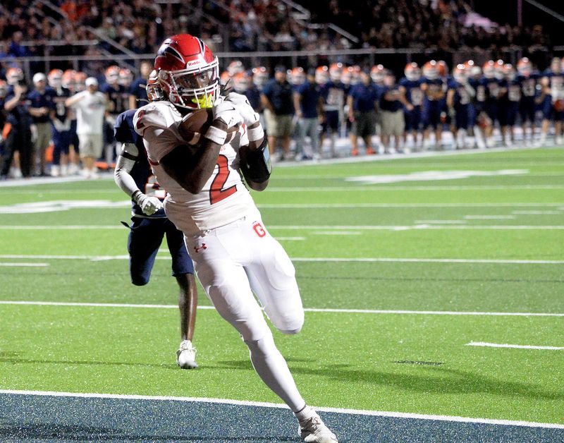 Glenwood's Larry Wills scores a touchdown during the game against Rochester Friday, Sept. 19, 2025.