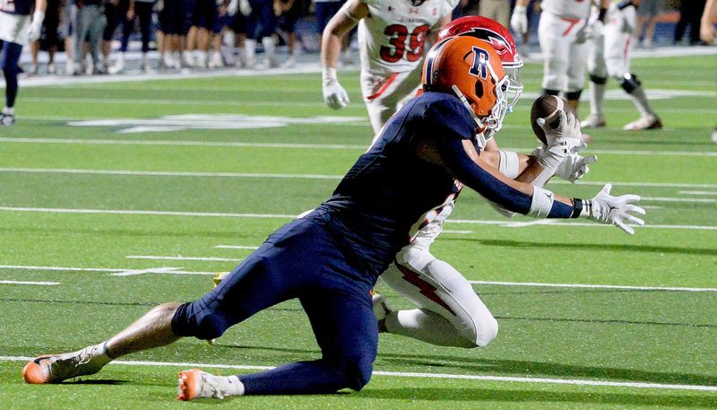 Chatham Glenwood's Jaxson Wix makes an interception during the game against Rochester on Friday, Sept. 19, 2025