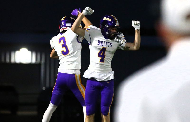 Williamsville's Griffin Watkins, right, celebrates with Kaden Entwistle after the latter's touchdown grab against Stanford Olympia on Friday, Sept. 26, 2025.