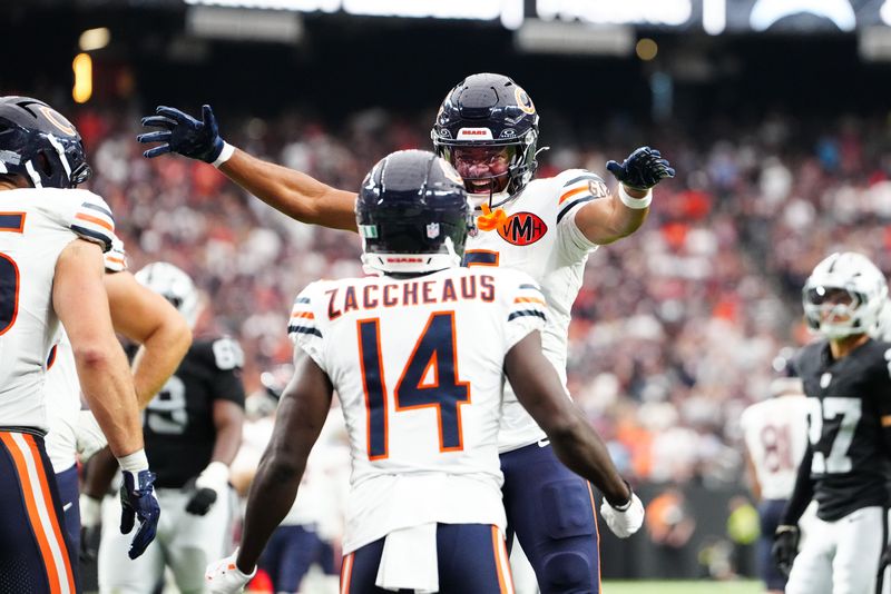 Sep 28, 2025; Paradise, Nevada, USA; Chicago Bears wide receiver Rome Odunze (15) celebrates a two point conversion during the second half against the Las Vegas Raiders at Allegiant Stadium. Mandatory Credit: Stephen R. Sylvanie-Imagn Images