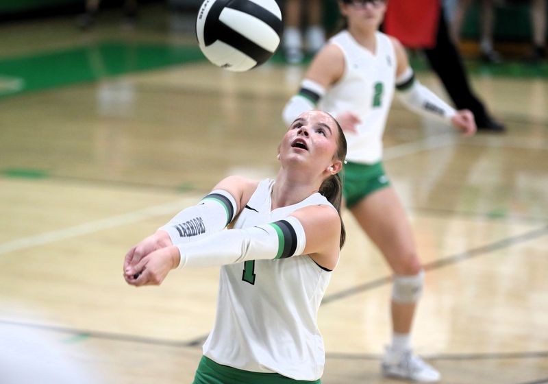 Athens' Arabelle Cunningham passes the ball against Pleasant Plains during the Sangamon County volleyball tournament in Athens on Monday, Sept. 29, 2025.