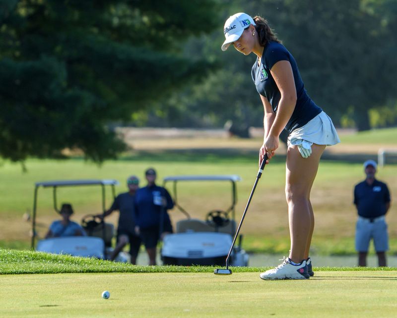 Peoria Notre Dame’s Josie Heffron watches one of her putts during the Class 1A girls high school golf regional Tuesday, Sept. 30, 2025 at Newman Golf Course in Peoria. Heffron won the individual event while the Irish finished in second place.