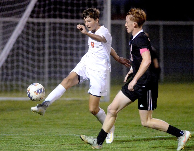 Rochester's Evan Lemme clears the ball against Springfield High at Lee Field on Thursday, Oct. 2, 2025.