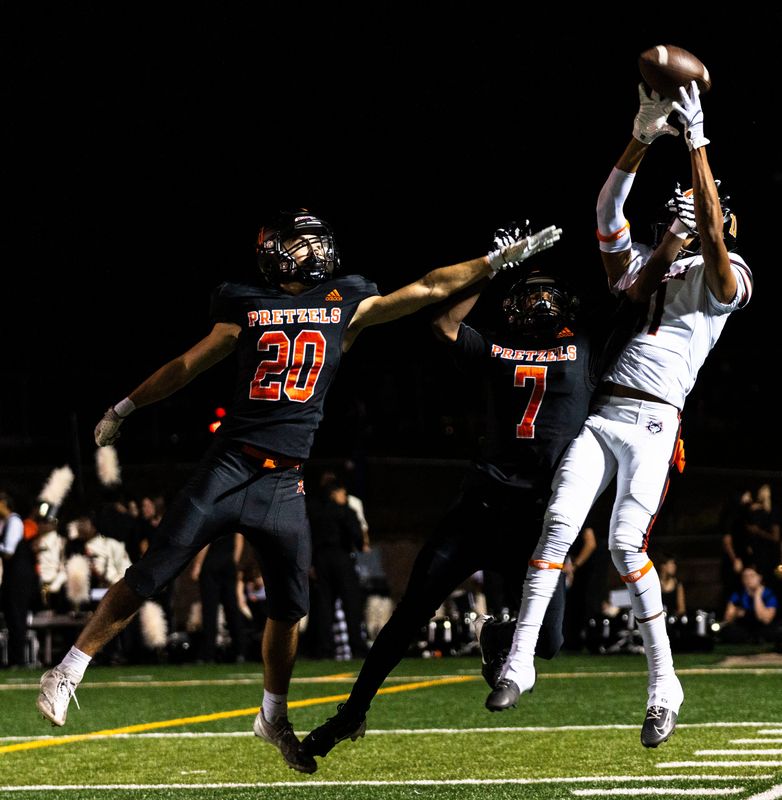 Harlem’s Jackson Cook (11) jumps up in attempt to catch a pass during a football game against Freeport on Oct. 3, 2025, at Freeport High School.
