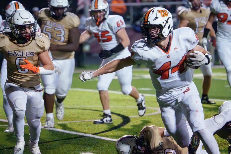 Washington running back Will Freeman (44) gets past the Dunlap defense for a touchdown in the second half of their Week 7 high school football game Friday, Oct. 10, 2025 at Dunlap High School. The Panthers defeated the Eagles 23-15.