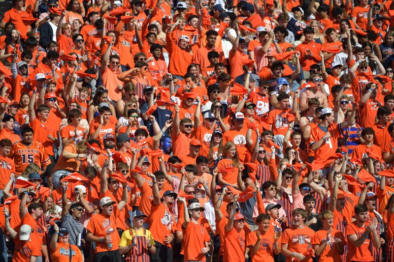 Oct 11, 2025; Champaign, Illinois, USA; Illinois Fighting Illini fans in the stands during the first quarter against the Ohio State Buckeyes at Memorial Stadium. Mandatory Credit: Ron Johnson-Imagn Images