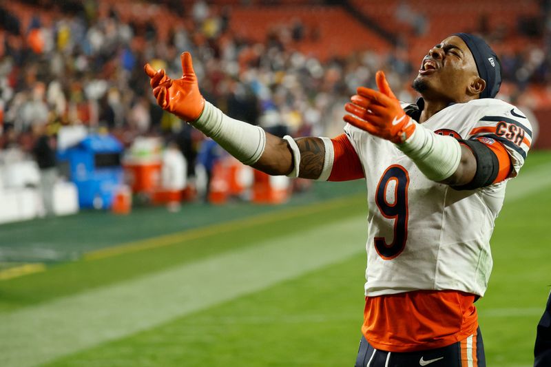 Oct 13, 2025; Landover, Maryland, USA; Chicago Bears safety Jaquan Brisker (9) celebrates while leaving the field after the game against the Washington Commanders at Northwest Stadium. Mandatory Credit: Geoff Burke-Imagn Images