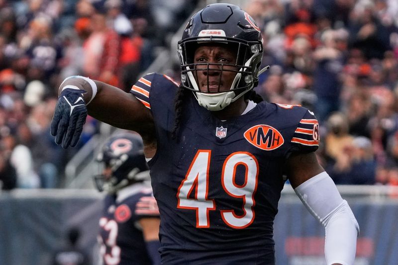 Oct 19, 2025; Chicago, Illinois, USA; Chicago Bears middle linebacker Tremaine Edmunds (49) reacts after sacking New Orleans Saints quarterback Spencer Rattler (not pictured) during the second half at Soldier Field. Mandatory Credit: David Banks-Imagn Images
