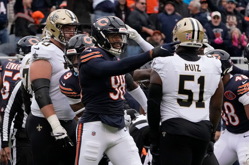 Oct 19, 2025; Chicago, Illinois, USA; Chicago Bears defensive end Montez Sweat (98) reacts after forcing a fumble against New Orleans Saints quarterback Spencer Rattler (not pictured) during the first half at Soldier Field. Mandatory Credit: David Banks-Imagn Images