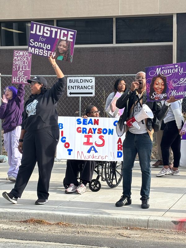 Sunshine Clemons, left, and Reggie Guyton, both of Springfield, protest outside of the Peoria County Courthouse on Oct. 24, 2025, as the first week of the Sean Grayson murder trial wraps up. The rally was organized by Peorians for Justice for Sonya Massey.
