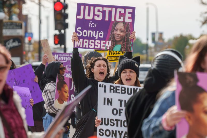 Protesters continue to rally outside the Peoria County Courthouse as jurors deliberate in the Sean Grayson murder trial Tuesday, Oct. 28, 2025 in Downtown Peoria.