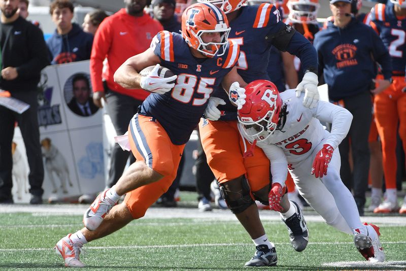 Nov 1, 2025; Champaign, Illinois, USA; Illinois Fighting Illini tight end Tanner Arkin (85) runs the ball past Rutgers Scarlet Knights defensive back Bo Mascoe (3) during the first half at Memorial Stadium. Mandatory Credit: Ron Johnson-Imagn Images