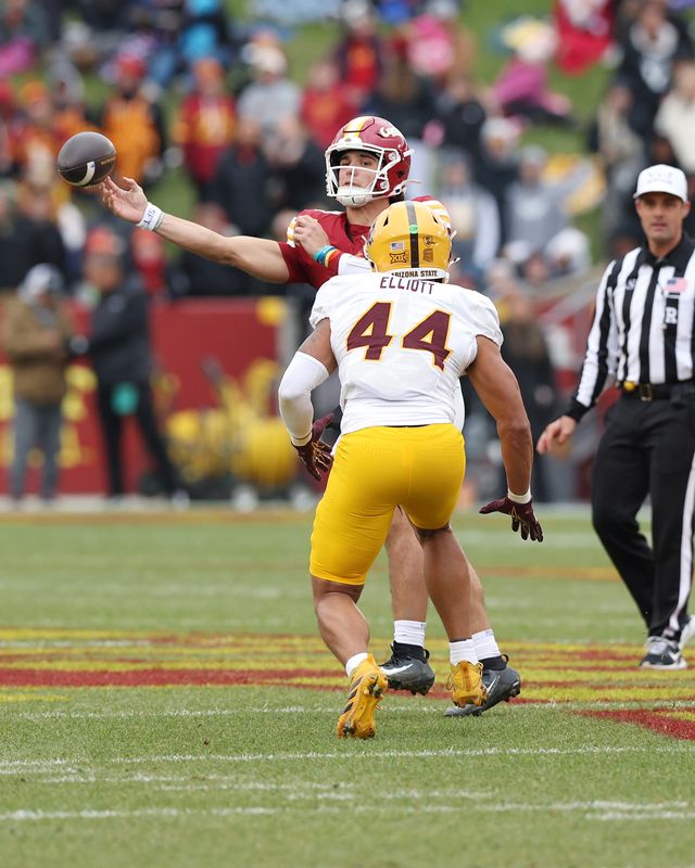 Nov 1, 2025; Ames, Iowa, USA; Iowa State Cyclones quarterback Rocco Becht (3) is pressured by Arizona State Sun Devils linebacker Keyshaun Elliott (44) during the first quarter at Jack Trice Stadium. Mandatory Credit: Reese Strickland-Imagn Images