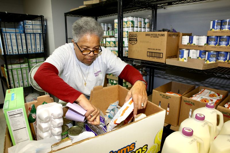 Rock River Valley Pantry volunteer Joyce Benson prepares donations for recipients on Nov. 3, 2025, at the pantry on Rockton Avenue in Rockford.
