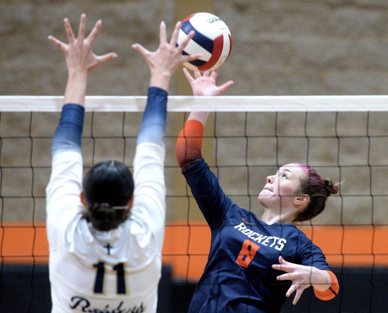 Rochester's Olivia Kratochvil goes up for one of her 17 kills against Quincy Notre Dame in the Class 2A Beardstown Sectional championship match on Thursday, Nov. 6, 2025.