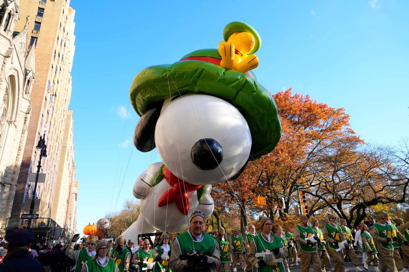 Beagle Scout Snoopy balloon on Central Park West during the 2023 MacyÃ•s Thanksgiving Day Parade in New York.