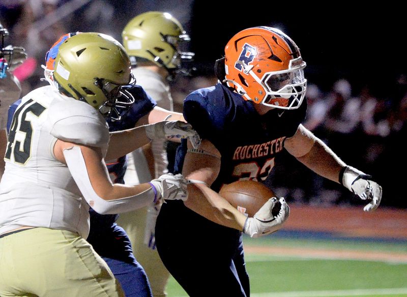 Rochester's Jorey Myren scores the winning touchdown in overtime during the game against Sacred Heart-Griffin Saturday, Nov. 15, 2025.