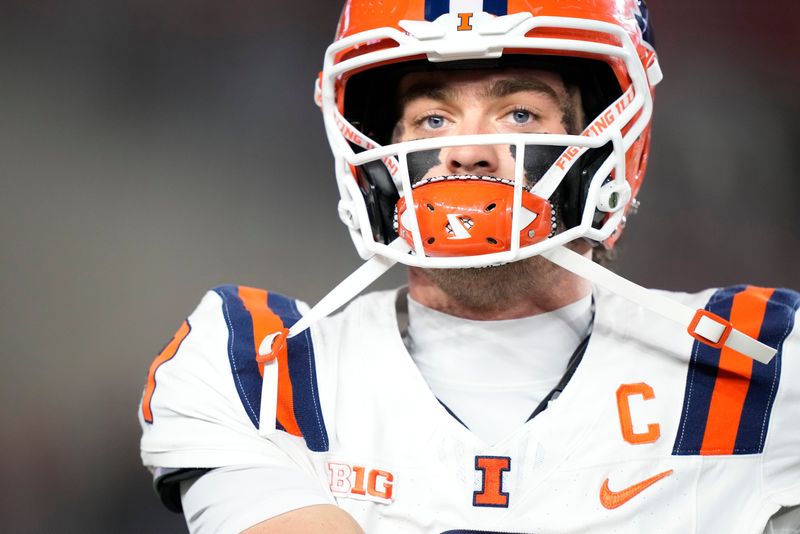 Nov 22, 2025; Madison, Wisconsin, USA; Illinois Fighting Illini quarterback Luke Altmyer (9) warms up before a game against the Wisconsin Badgers at Camp Randall Stadium. Mandatory Credit: Kayla Wolf-Imagn Images