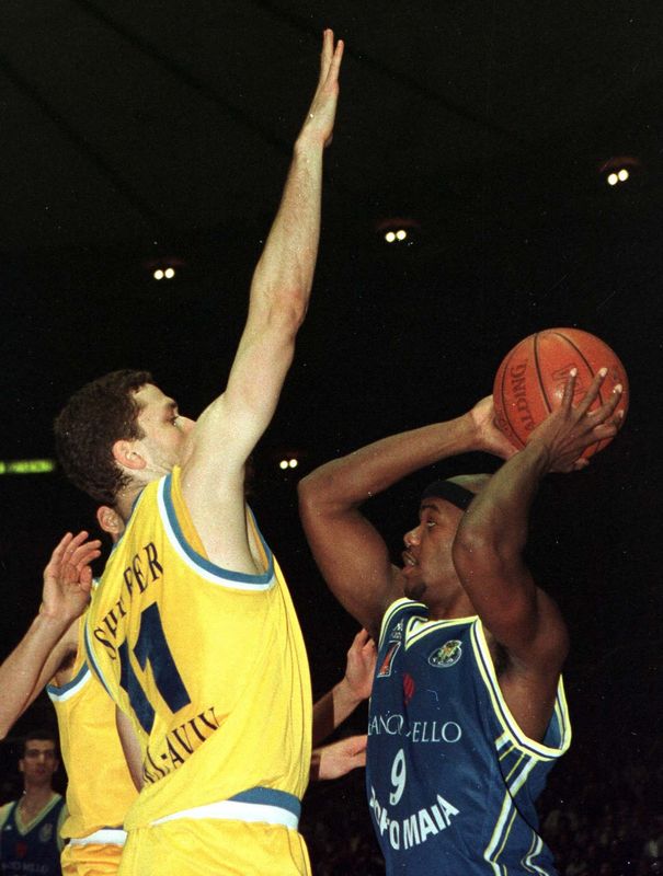 Anthony Allison of Porto, right, is defended by a Maccbi Tel Aviv player during their Euroleague basketball match on January 15, 1998.