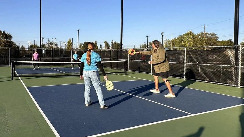 Residents play pickleball at a City of Monroe park.