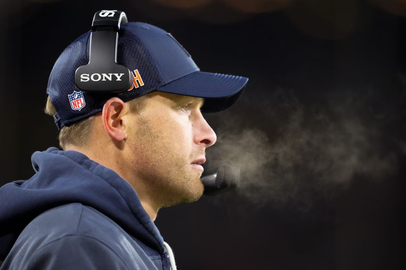 Dec 7, 2025; Green Bay, Wisconsin, USA; Chicago Bears head coach Ben Johnson looks on during the second quarter against the Green Bay Packers at Lambeau Field. Mandatory Credit: Jeff Hanisch-Imagn Images