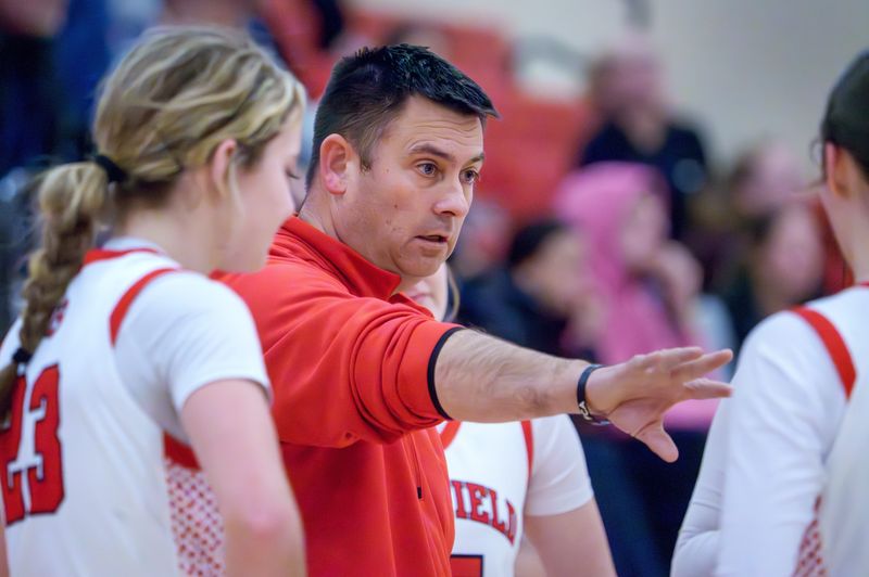 Brimfield head coach Josh McKown talks with the Indians as they battle IVC in the second half of their high school basketball game Wednesday, Dec. 10, 2025 in Brimfield. The Grey Ghosts defeated the Indians 59-31.