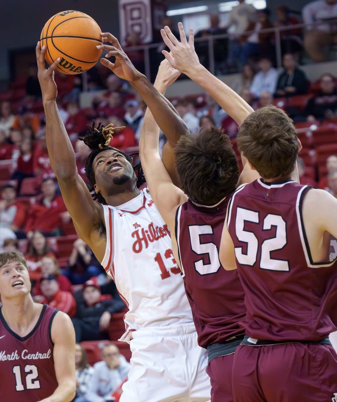 Bradley's Handy Toussaint III tries to grab a rebound against North Central College in the second half of their college basketball game Sunday, Dec. 14, 2025 at Renaissance Coliseum in Peoria. The Braves defeated the Cardinals 86-53.