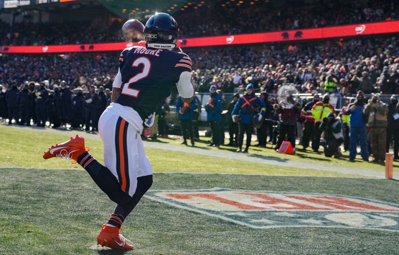 Dec 14, 2025; Chicago, Illinois, USA; Chicago Bears wide receiver DJ Moore (2) catches a pass for a touchdown during the first quarter against the Cleveland Browns at Soldier Field. Mandatory Credit: David Banks-Imagn Images