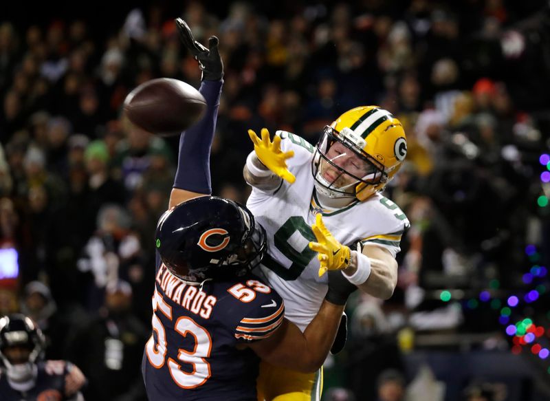 Chicago Bears linebacker T.J. Edwards (53) breaks up a pass intended for Green Bay Packers wide receiver Christian Watson (9) in the endzone in the second quarter during their football game Saturday, December 20, 2025, at Soldier Field in Chicago, Illinois.