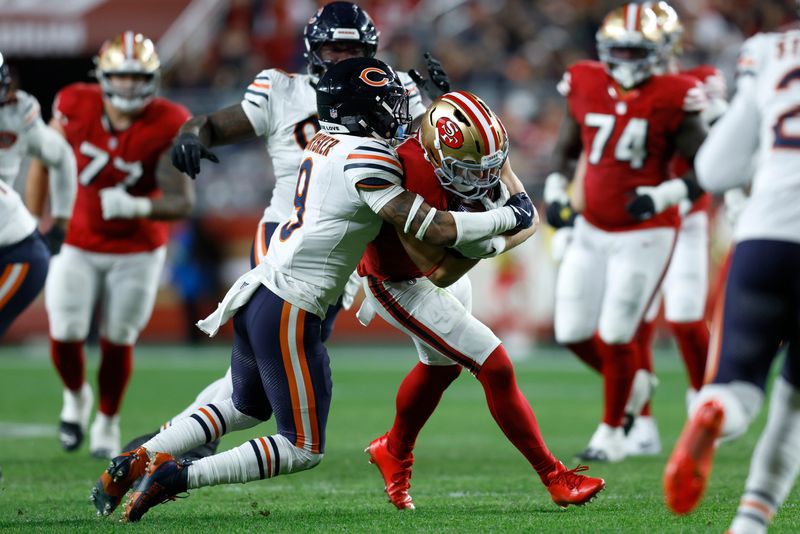 Dec 28, 2025; Santa Clara, California, USA; Chicago Bears safety Jaquan Brisker (9) tackles San Francisco 49ers fullback Kyle Juszczyk (44) in the second half at Levi's Stadium. Mandatory Credit: Sergio Estrada-Imagn Images