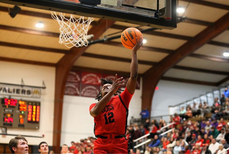 Staunton's Jeremiah Graham converts a layup against Hardin Calhoun during the Carlinville Holiday Tournament boys basketball championship game on Monday, Dec. 29, 2025.
