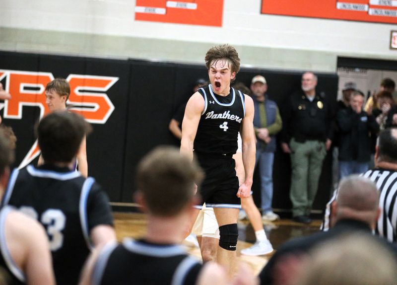 North Mac's Collin Etter celebrates a 52-40 victory over Jacksonville Routt in the Waverly Holiday Tournament championship game on Tuesday, Dec. 30, 2025.