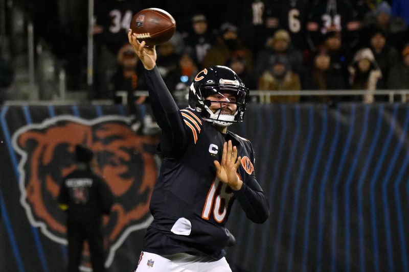 Jan 4, 2026; Chicago, Illinois, USA; Chicago Bears quarterback Caleb Williams (18) passes the ball against the Detroit Lions during the second half at Soldier Field. Mandatory Credit: Matt Marton-Imagn Images