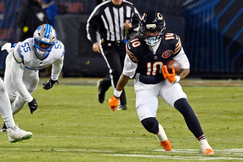 Jan 4, 2026; Chicago, Illinois, USA; Chicago Bears wide receiver Luther Burden III (10) runs with the ball against the Detroit Lions during the second half at Soldier Field. Mandatory Credit: Matt Marton-Imagn Images